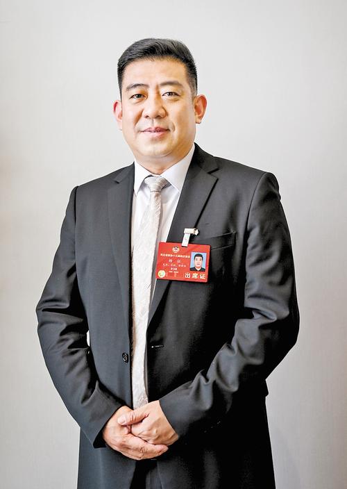 杨征委员。 本报记者 耿 辉摄